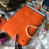 NueVue iPad case orange vegan leather with self cleaning interior