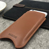 NueVue iPhone 13 mini case tan leather self cleaning case lifestyle